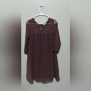 A.U.W brown shirt and the size is  Medium